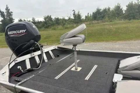 Slide: The Image of 2023 Rhino JET boat with Mercury engine, featuring swivel seats and spacious deck. - 3