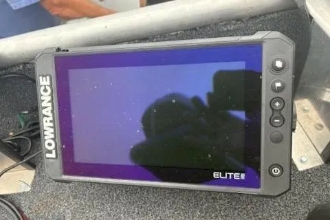 Slide: The Image of Lowrance Elite fish finder on Rhino JET 2023 boat dashboard. - 8