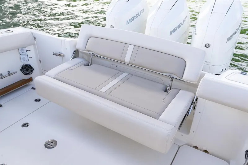 Slide: The Image of Manufacturer Provided Image: 2025 Boston Whaler 350 Realm boat with foldable seating and Mercury engines. - 9