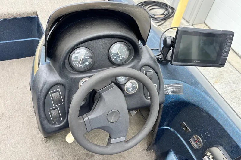 Slide: The Image of Steering console of 1998 Nitro 800 LXS boat with Garmin GPS device. - 6