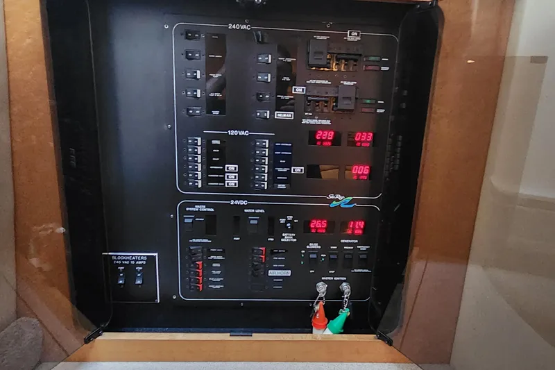 Slide: The Image of Electrical control panel on a 1998 Sea Ray 630 Super Sun Sport yacht. - 10