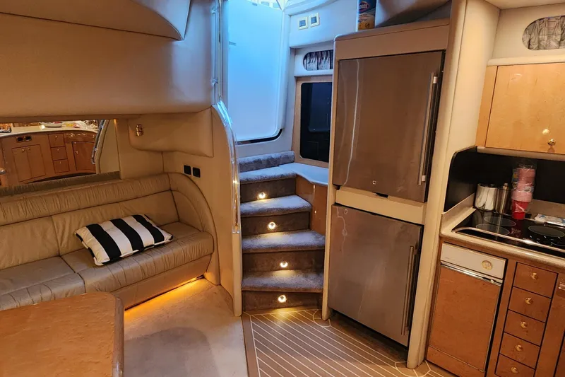 Slide: The Image of Luxurious interior of 1998 Sea Ray 630 Super Sun Sport yacht with modern amenities. - 11