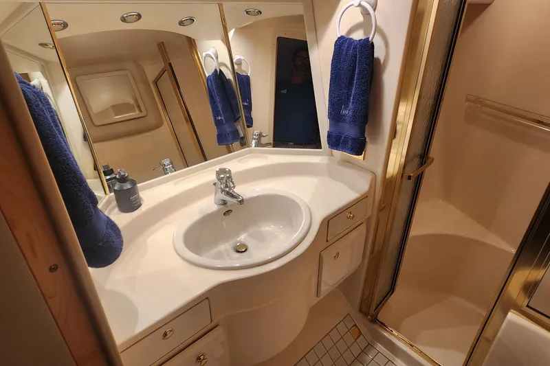Slide: The Image of Luxurious bathroom interior of 1998 Sea Ray 630 Super Sun Sport yacht. - 13