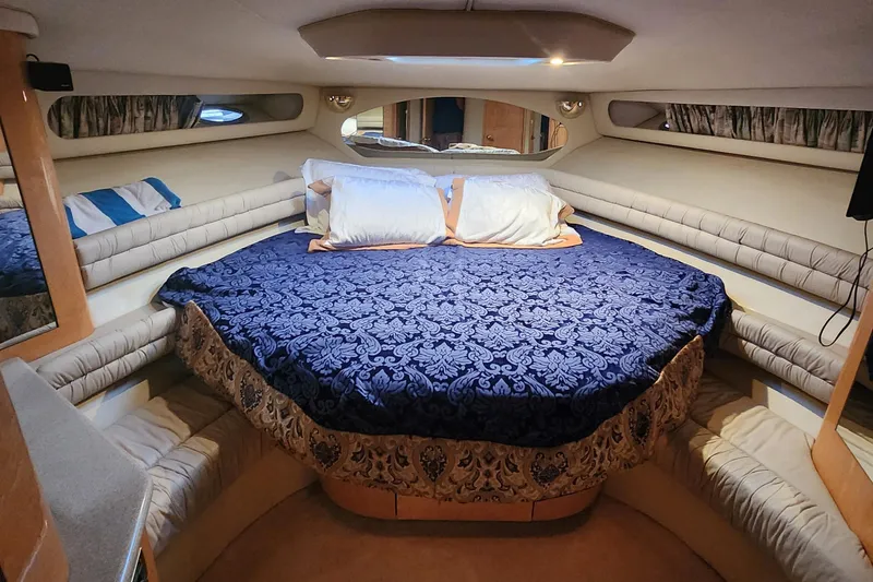 Slide: The Image of Luxurious cabin interior of 1998 Sea Ray 630 Super Sun Sport yacht. - 14