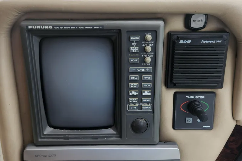 Slide: The Image of Control panel of a 1998 Sea Ray 630 Super Sun Sport yacht with navigation and communication systems. - 53