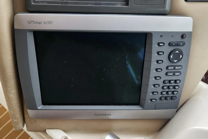 Slide: The Image of Garmin GPSmap 4210 on 1998 Sea Ray 630 Super Sun Sport yacht dashboard. - 54