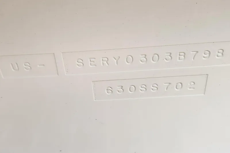 Slide: The Image of Hull identification number on 1998 Sea Ray 630 Super Sun Sport boat. - 57