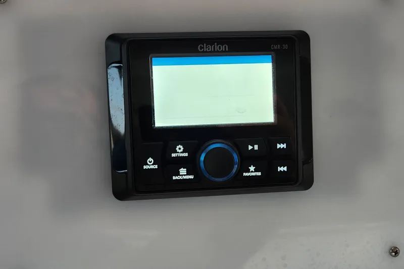 Slide: The Image of Clarion CMR-30 audio control panel on 1998 Sea Ray 630 Super Sun Sport yacht. - 6