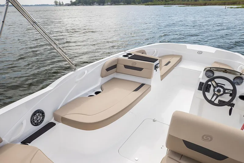 Slide: The Image of Manufacturer Provided Image: 2021 Hurricane SunDeck Sport 185 OB boat interior with beige seating on a lake. - 7