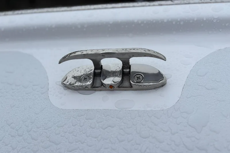 Slide: The Image of Stainless steel boat cleat on wet surface, Weaver 270, 2025 model. - 5