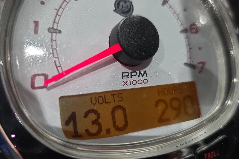 Slide: The Image of Close-up of a 2016 Nitro Z21 tachometer showing 13 volts and 290 hours. - 7