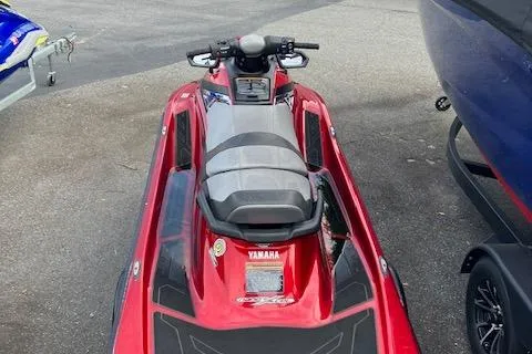 Slide: The Image of 2019 Yamaha WaveRunner VX Limited in red, parked on pavement. - 6