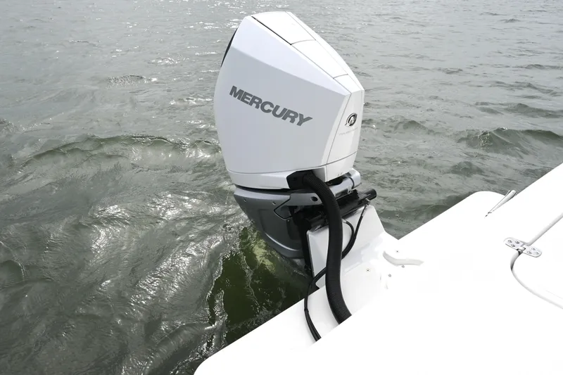 Slide: The Image of 2022 Steiger Craft 255DV Miami with Mercury outboard motor on water. - 11