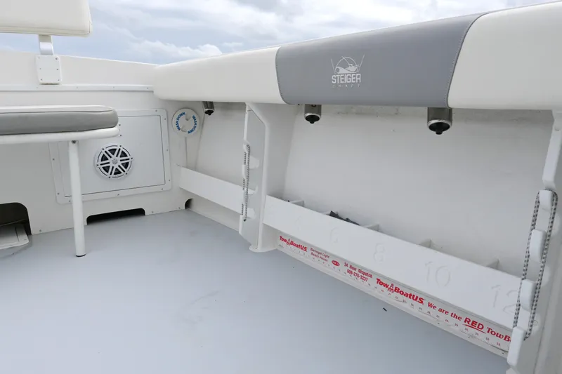 Slide: The Image of 2022 Steiger Craft 255DV Miami boat interior with seating and storage features. - 19