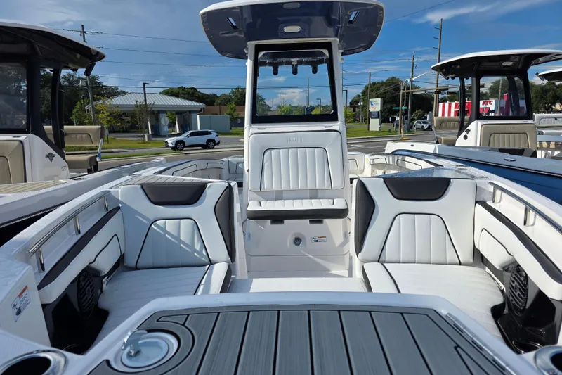 Slide: The Image of 2025 Yamaha Boats 252 FSH Sport interior with sleek seating and modern design. - 10