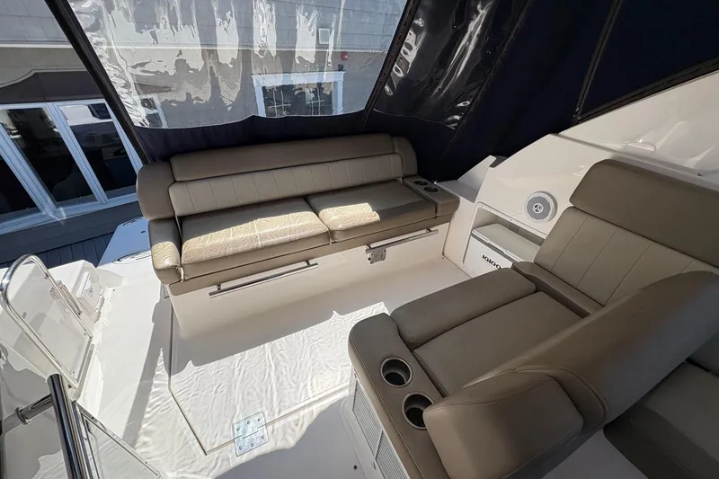 Slide: The Image of 2013 Regal 35 Sport Coupe boat with beige seating, named "Madlynn IV," Mount Olive, NJ. - 24