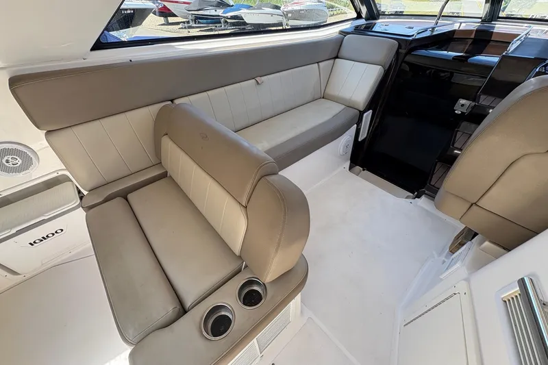 Slide: The Image of Engine compartment of a 2013 Regal 35 Sport Coupe with dual engines and wiring. - 25