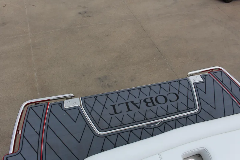 Slide: The Image of 2025 Cobalt R6 boat deck with stylish design and branding. - 11