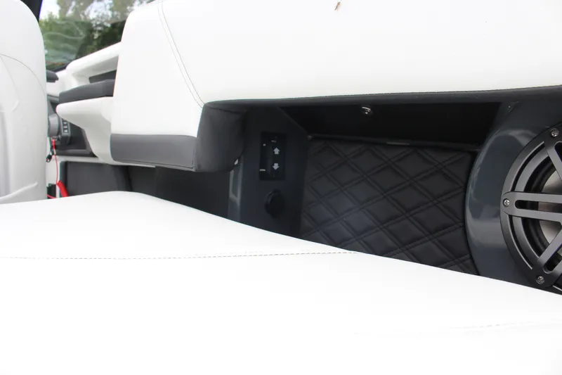 Slide: The Image of 2025 Cobalt R6 interior with white seating and speaker detail. - 28