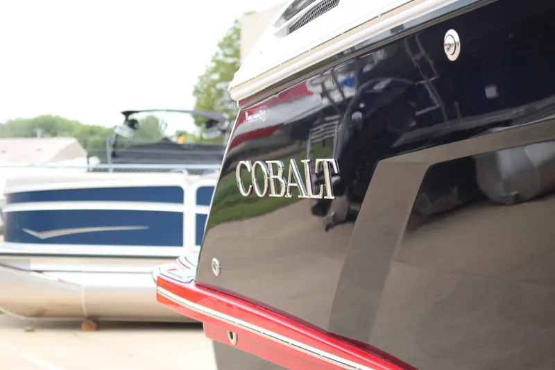 Slide: The Image of 2025 Cobalt R6 boat with sleek design and reflective finish. - 4