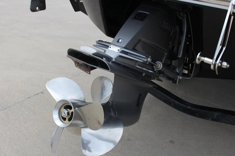 Slide: The Image of 2025 Cobalt R6 boat propeller and outdrive on concrete surface. - 6