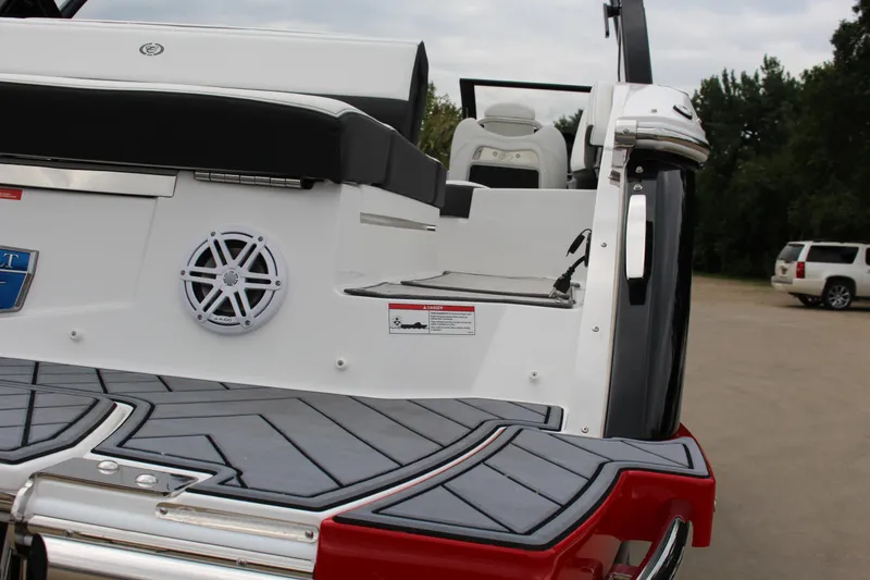 Slide: The Image of 2025 Cobalt R6 boat rear view with speaker and swim platform. - 8