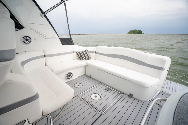 Slide: The Image of 2008 Formula 40 Performance Cruiser interior with white seating, on open water. - 16