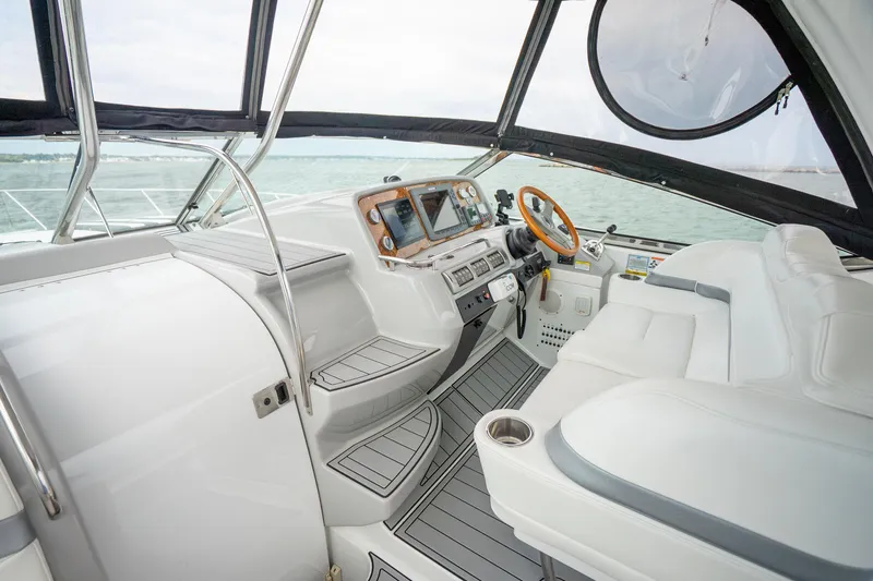 Slide: The Image of 2008 Formula 40 Performance Cruiser cockpit with modern controls and seating. - 20