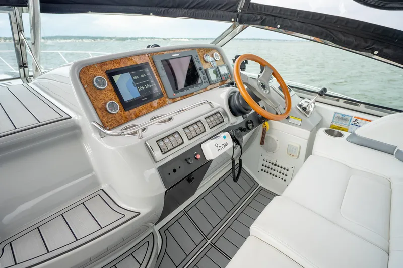 Slide: The Image of 2008 Formula 40 Performance Cruiser helm with modern navigation equipment and leather seating. - 21