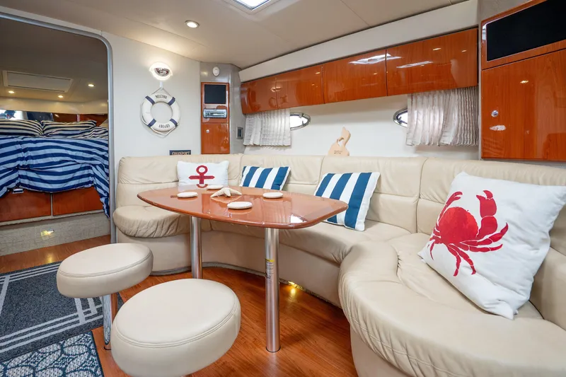 Slide: The Image of Luxurious 2008 Formula 40 Performance Cruiser interior with nautical-themed decor and plush seating. - 25