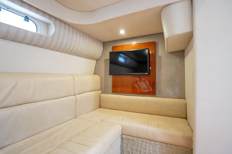 Slide: The Image of Interior of 2008 Formula 40 Performance Cruiser with beige seating and wall-mounted TV. - 30