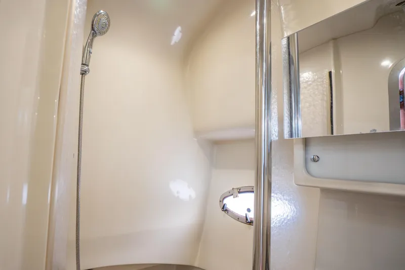 Slide: The Image of 2008 Formula 40 Performance Cruiser bathroom with showerhead and mirror. - 34