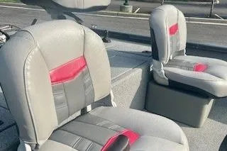 Slide: The Image of 2017 Tracker Pro Team 175 TF boat seats with gray and red upholstery. - 12