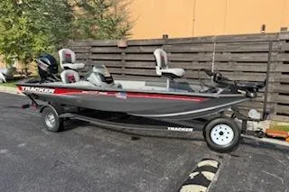 Slide: The Image of 2017 Tracker Pro Team 175 TF fishing boat on trailer, parked outdoors. - 3