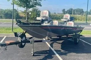 Slide: The Image of 2017 Tracker Pro Team 175 TF boat on trailer in parking lot. - 7