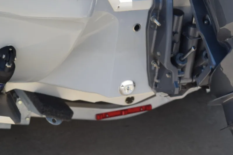 Slide: The Image of 2021 Stingray 236CC boat transom with motor mount and trailer detail. - 5