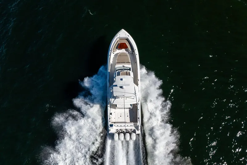 Slide: The Image of Aerial view of 2021 Boston Whaler 420 Outrage cruising on open water. - 15