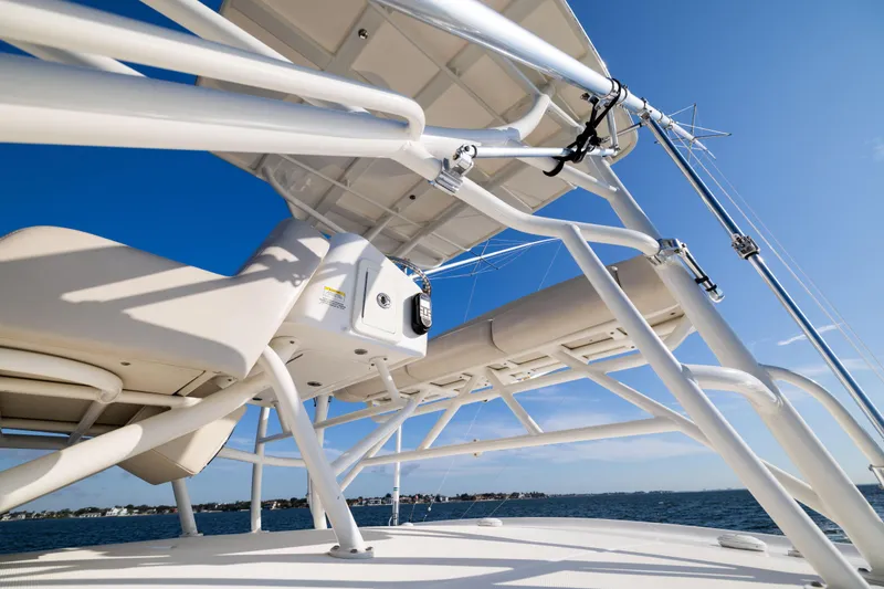 Slide: The Image of 2021 Boston Whaler 420 Outrage boat structure against clear blue sky. - 57