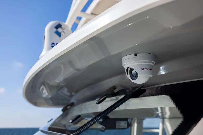 Slide: The Image of 2021 Boston Whaler 420 Outrage with Raymarine camera, ocean backdrop. - 66
