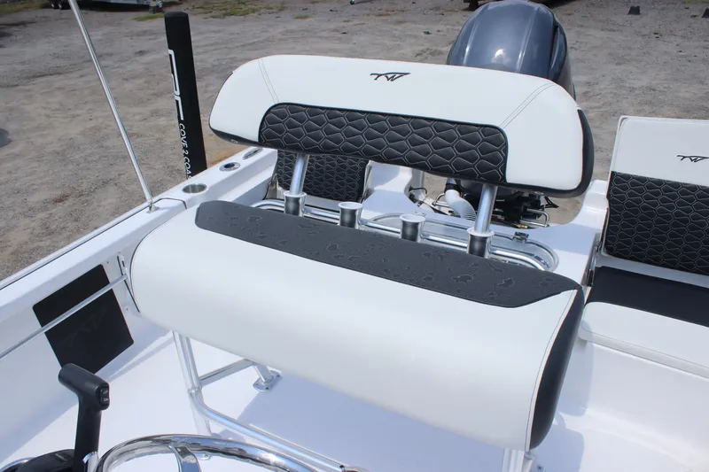 Slide: The Image of 2026 Tidewater 1910 Bay Max boat interior with stylish seating and modern design. - 14