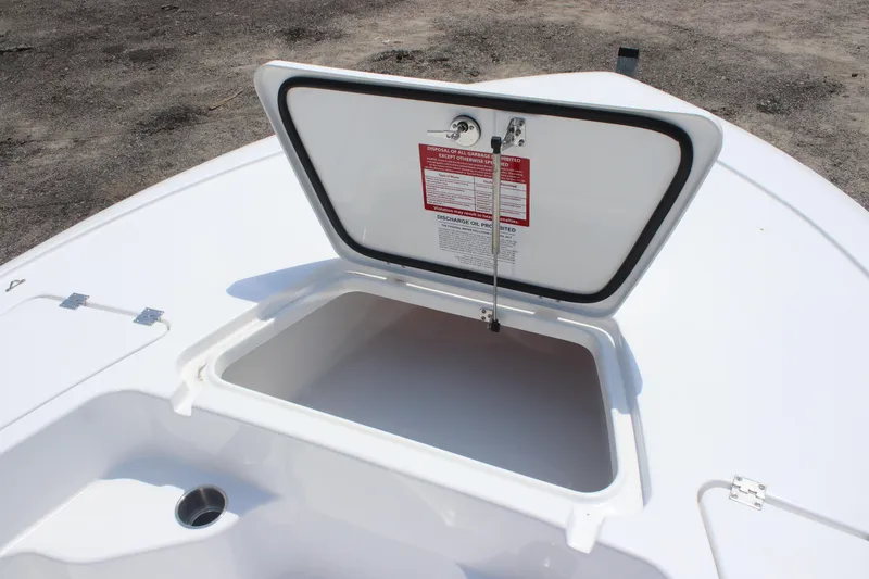 Slide: The Image of Open storage compartment on 2026 Tidewater 1910 Bay Max boat. - 16