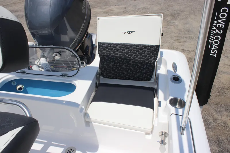 Slide: The Image of 2026 Tidewater 1910 Bay Max boat interior with seating and motor details. - 21