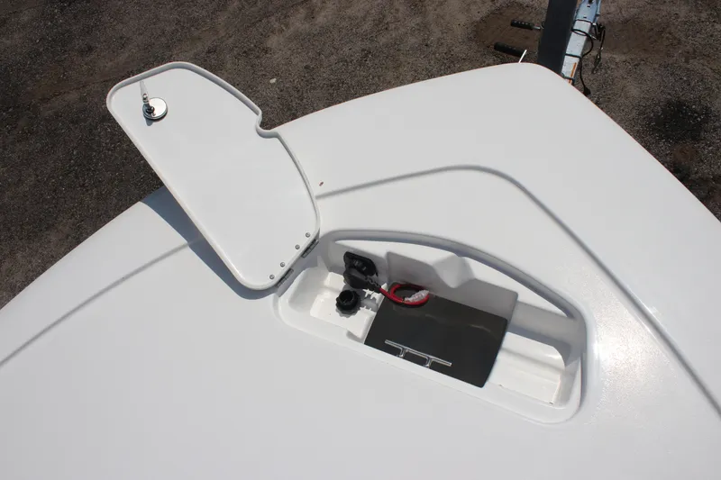 Slide: The Image of 2026 Tidewater 1910 Bay Max boat deck with open storage compartment. - 7