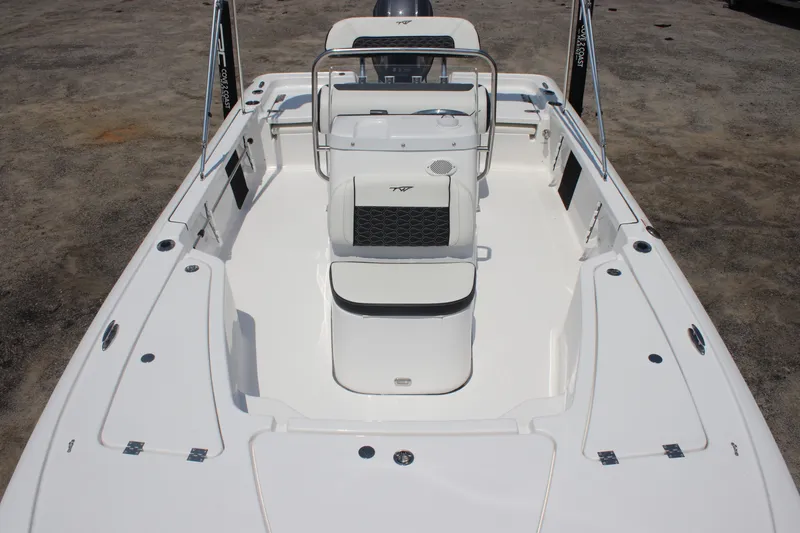Slide: The Image of 2026 Tidewater 1910 Bay Max boat interior, featuring sleek white design and modern seating. - 8