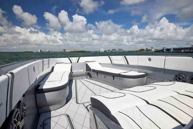 Slide: The Image of Luxurious 2022 Midnight Express 43 Open boat interior with plush seating and ocean view. - 34