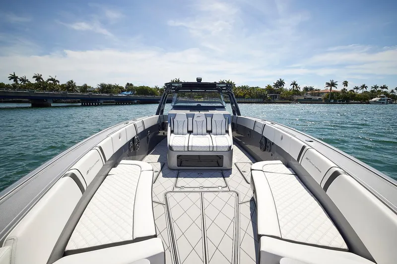Slide: The Image of 2022 Midnight Express 43 Open luxury boat interior on a sunny day. - 35