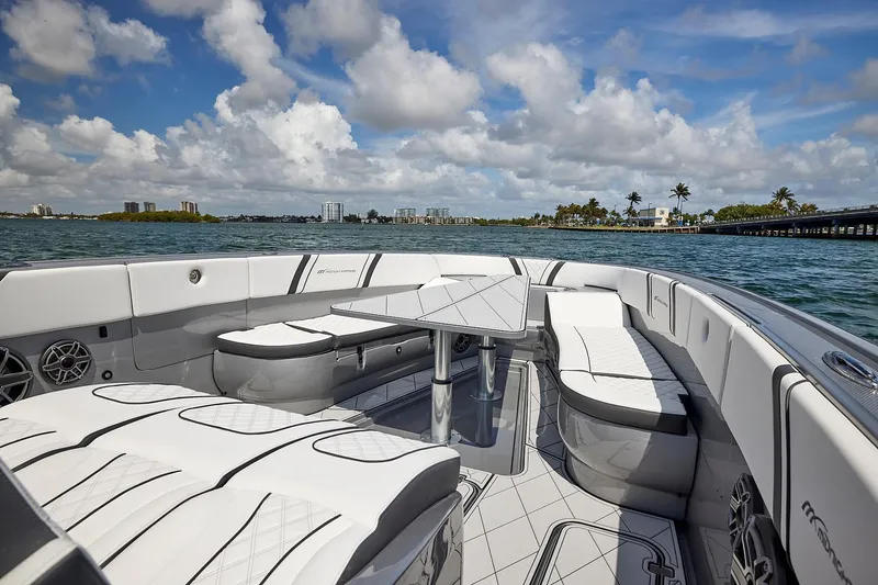 Slide: The Image of 2022 Midnight Express 43 Open boat interior with luxurious seating and ocean view. - 38