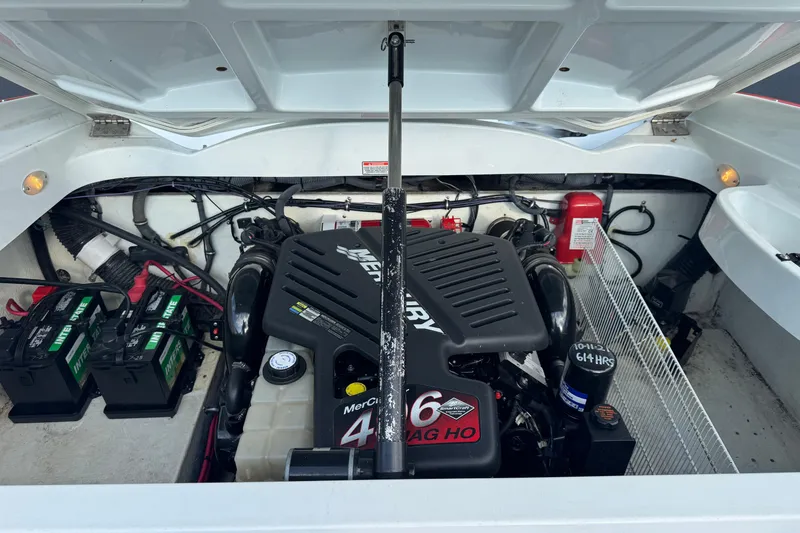 Slide: The Image of 2004 Baja 275 boat engine compartment with Mercury 496 Mag HO engine and batteries. - 12