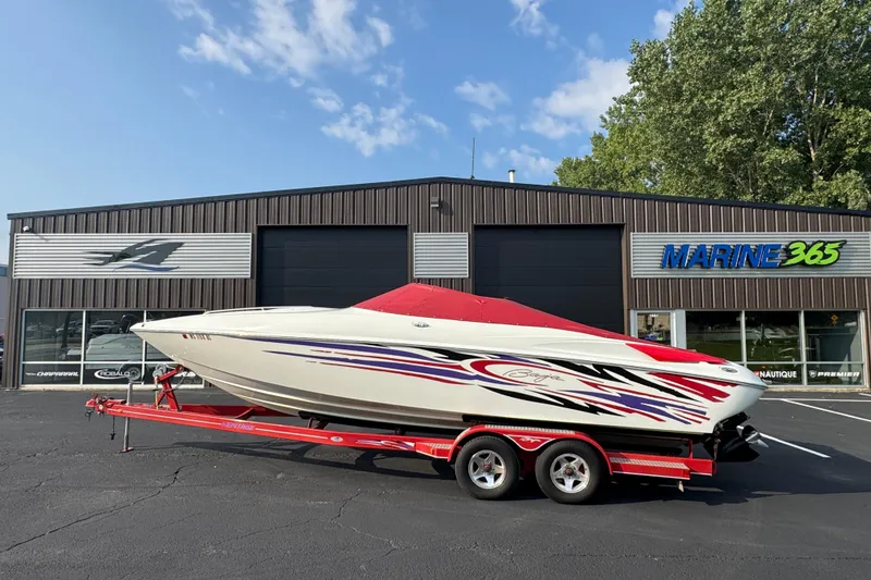 Slide: The Image of 2004 Baja 275 boat on trailer outside Marine 365 dealership. - 8