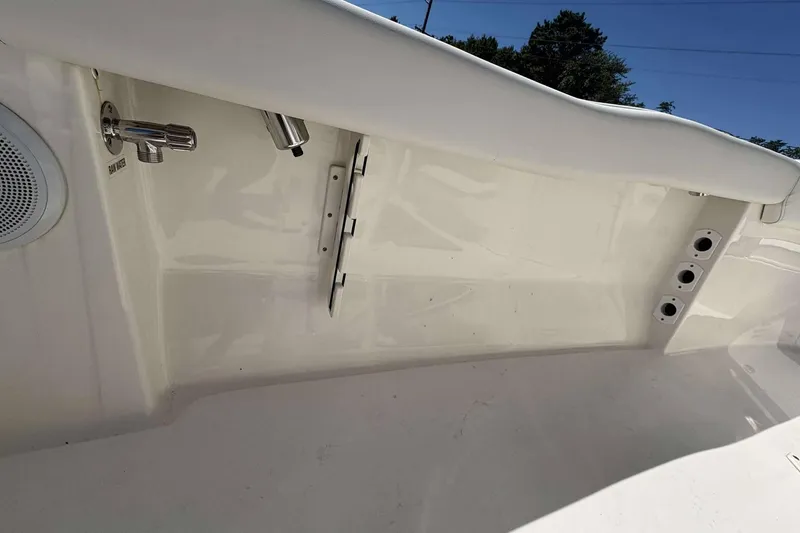 Slide: The Image of 2024 Key West 203 FS boat interior, featuring sleek white design and modern fixtures. - 13